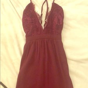 Long maroon formal dress with spaghetti straps